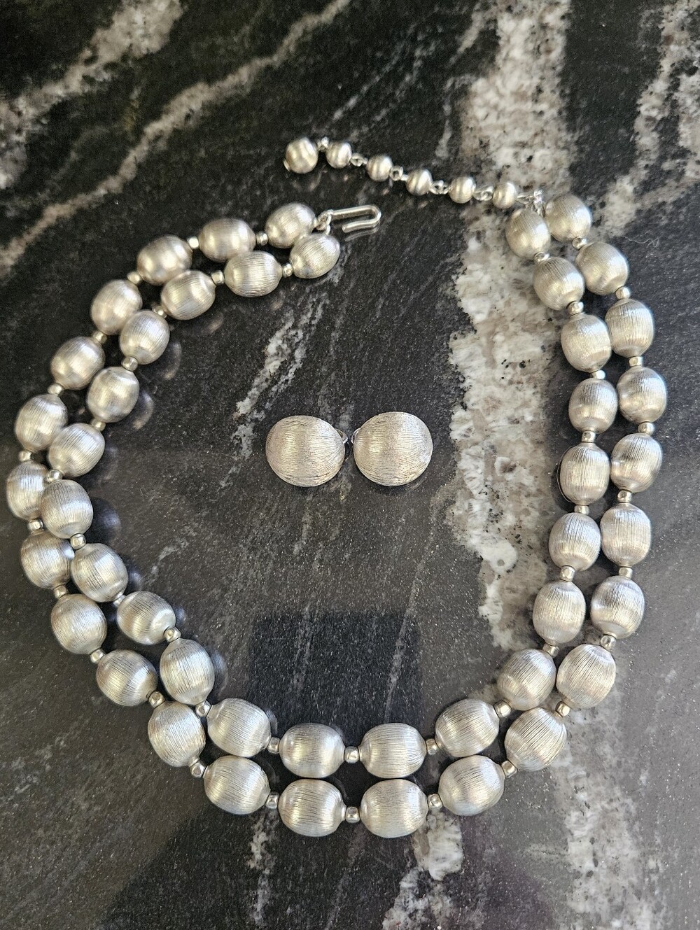 Beautiful vintage mid-century Crown Trifari silver-tone demi-parure jewelry set.